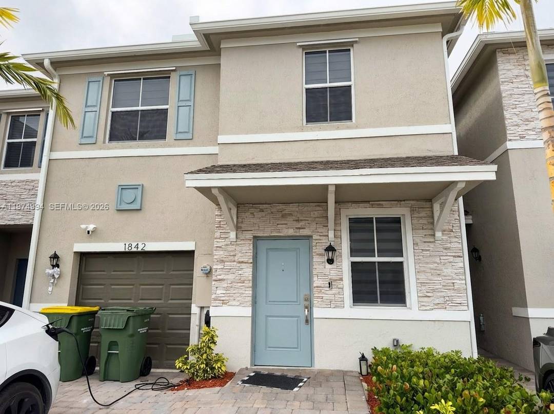 Welcome home to Marbella, a stunning new townhome community surrounded by lush greenery !