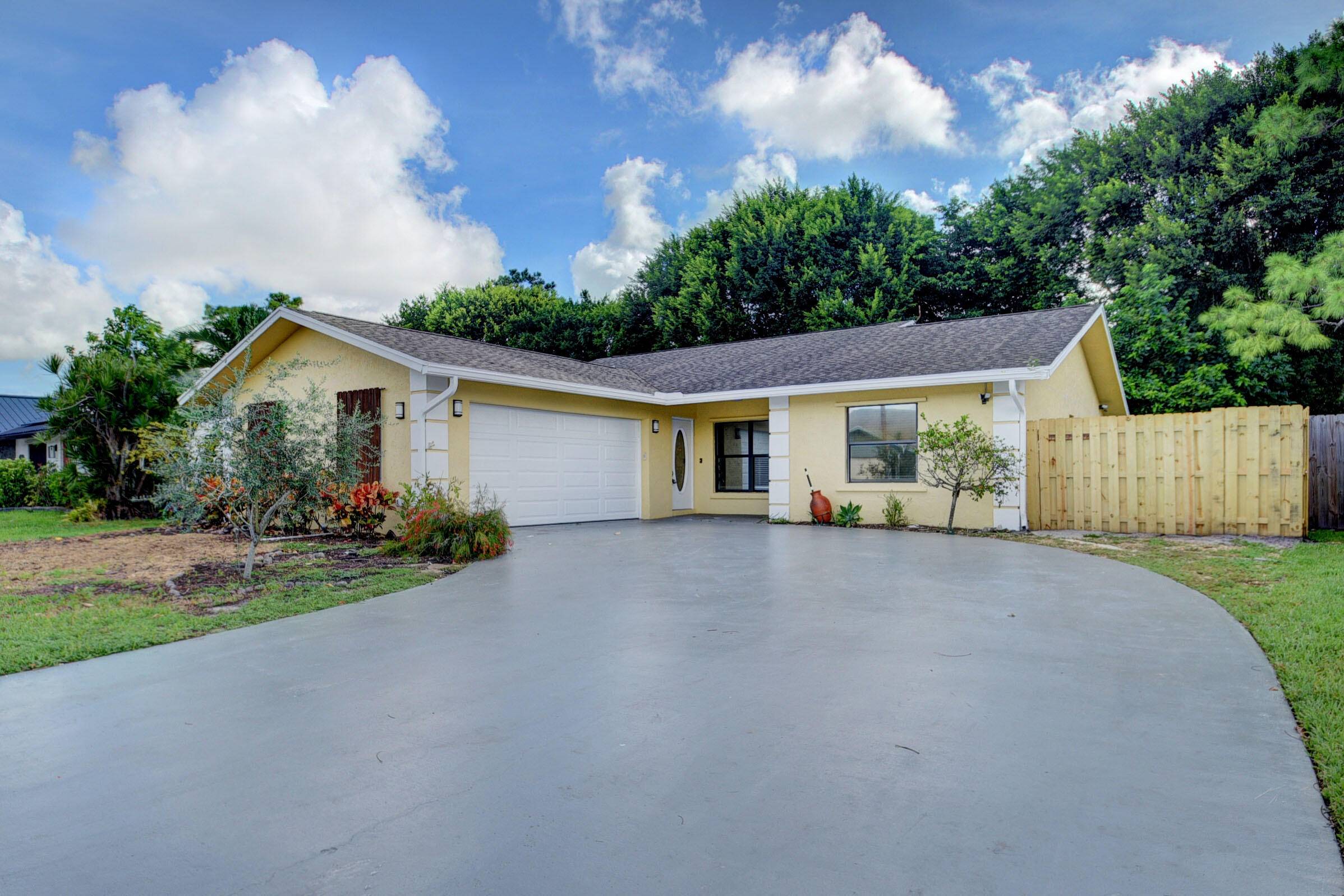 This property was renovated with light fixtures, updated bathrooms, new tub in master, new flooring throughout, new landscaping in 2022, newer garage door opener, and a huge backyard with plenty ...