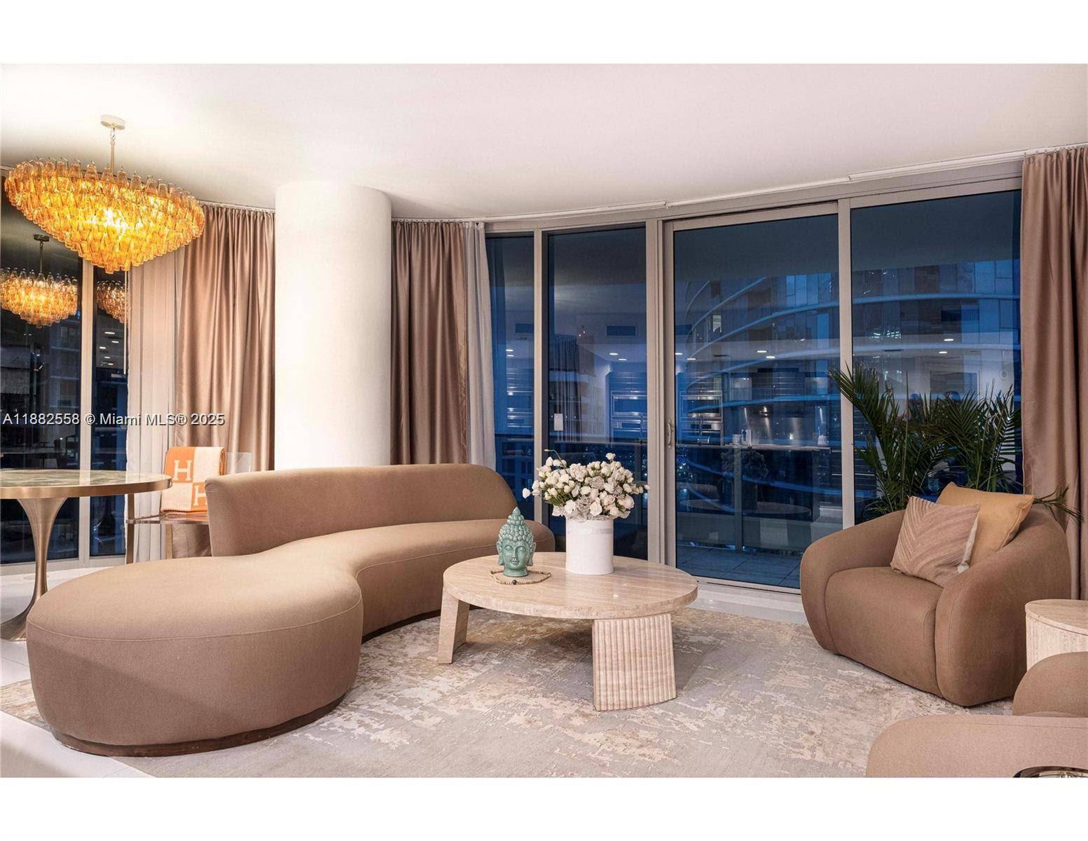 Rare layout with floor to ceiling windows, porcelain white glass floors, and a 330 sq.