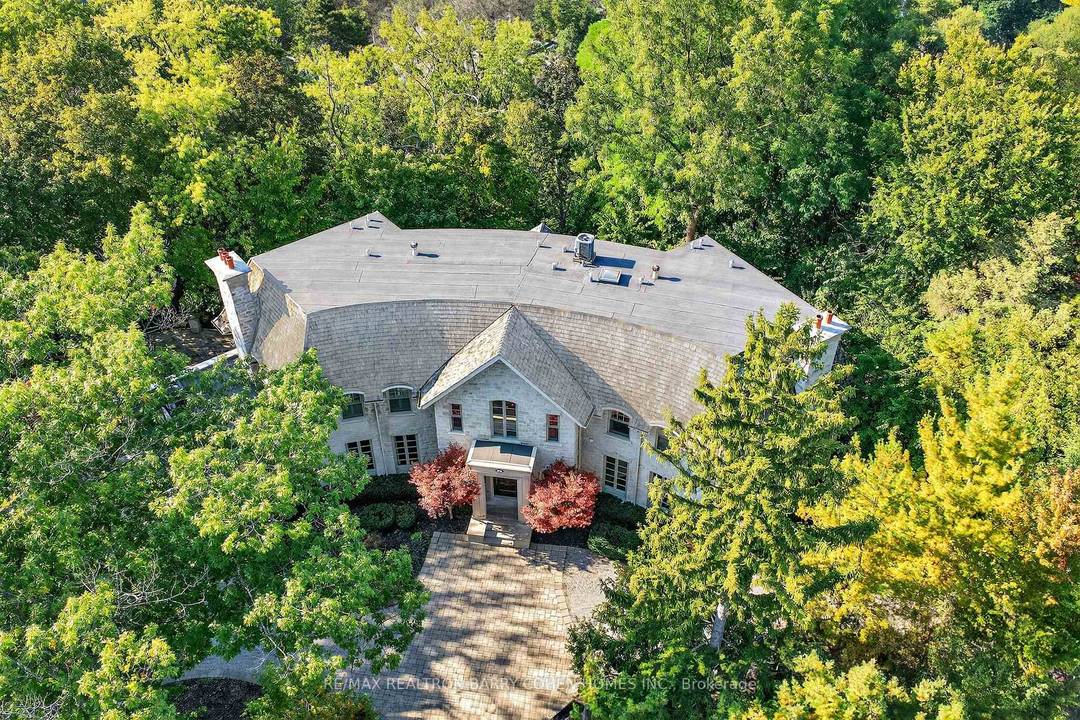 Backs Onto Ravine ! Perched gracefully at the highest point of Hoggs Hollow, this French Cha teau inspired masterpiece sits on a spectacular 239.