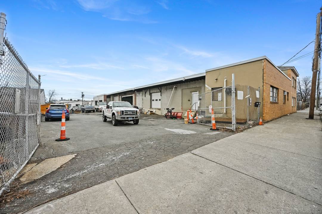 A remarkable investment package featuring Eight contiguous lots nestled on Stamford's sought after west side.