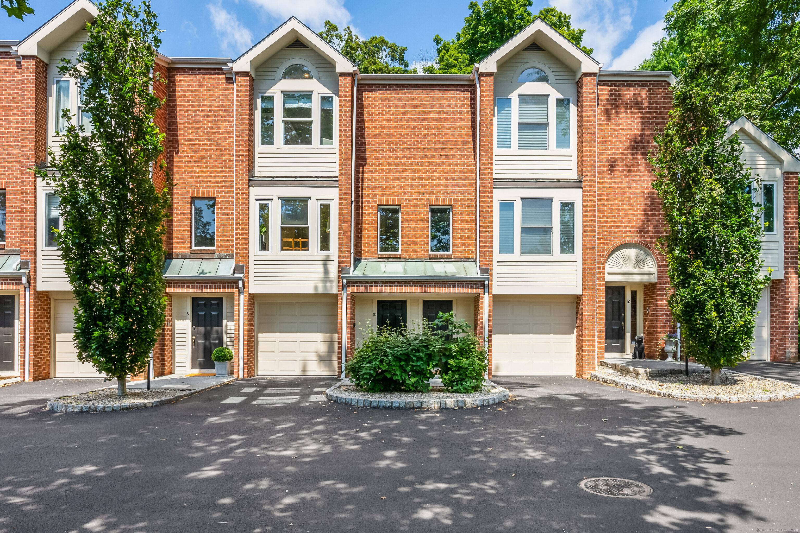 Sophisticated two bedroom, two full bathroom townhouse walkable to town and train.