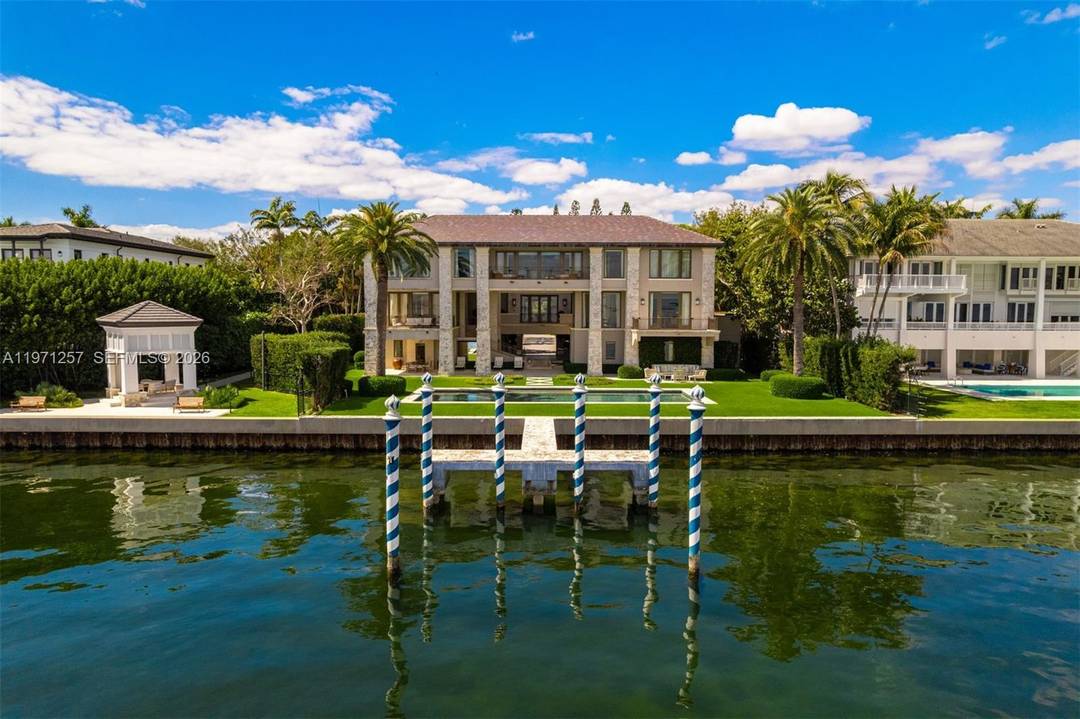 A remarkably beautiful bayfront estate on the exclusive private island of Tahiti Beach within the guard gated community of Cocoplum in Coral Gables.