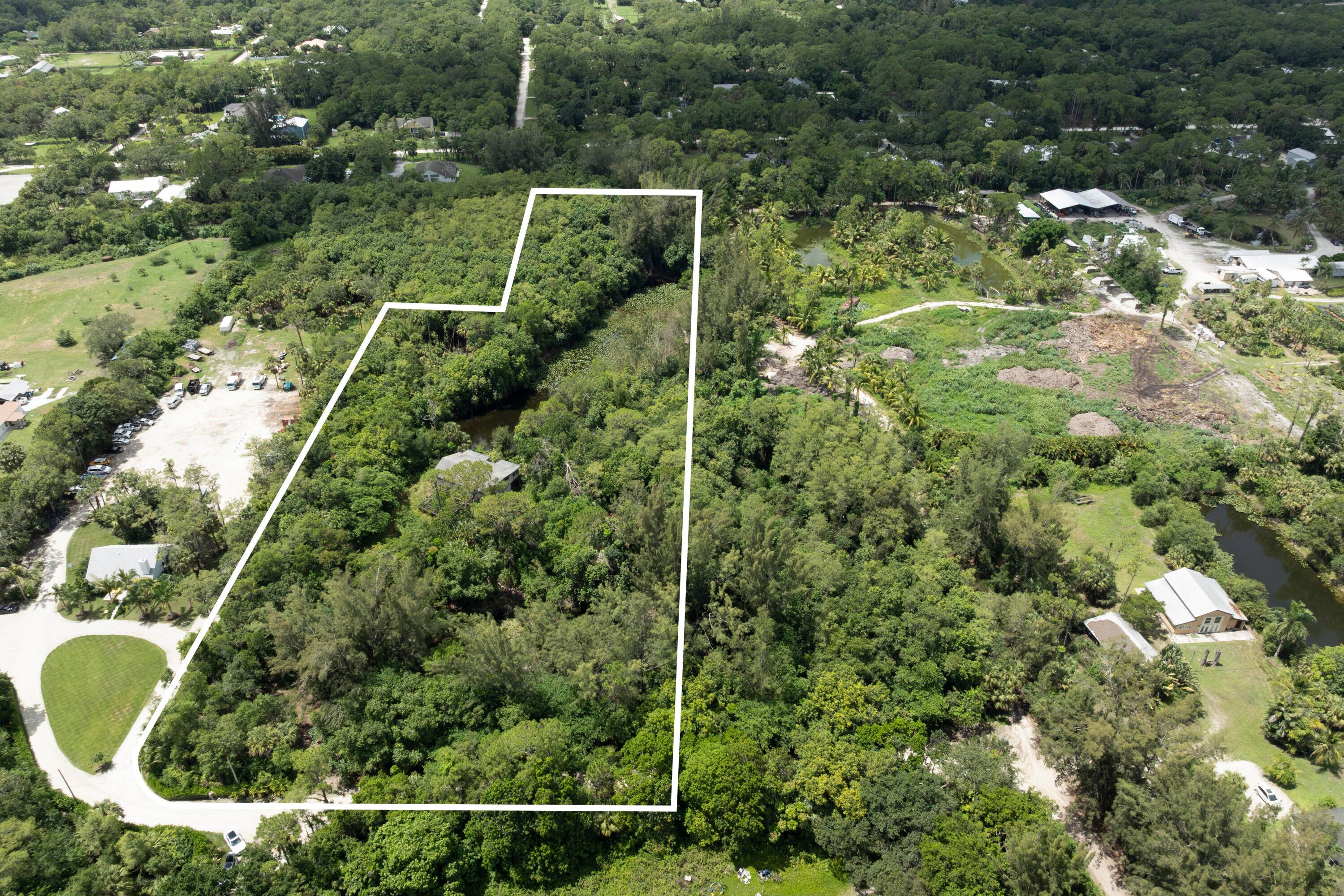 Exceptional 6. 09 Acre Agricultural Residential Property in Jupiter Farms Prime LocationDiscover the perfect blend of serenity and convenience with this rare 6.