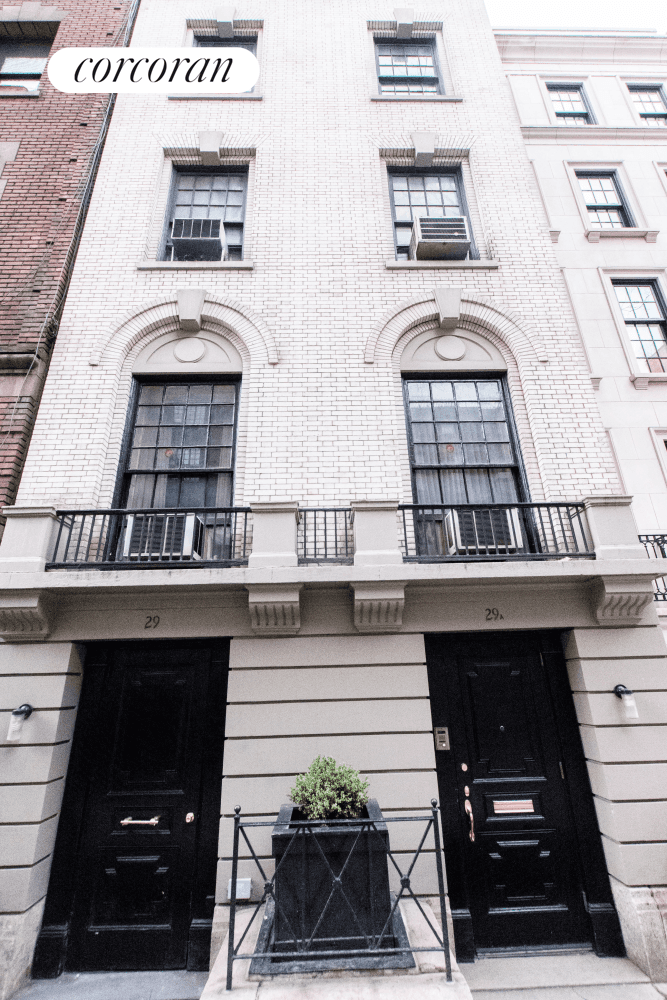 Sprawling legal three family under construction with approved plans to build an exquisite and majestic single family townhouse with elevator on one of the most upscale and exclusive Manhattan blocks ...
