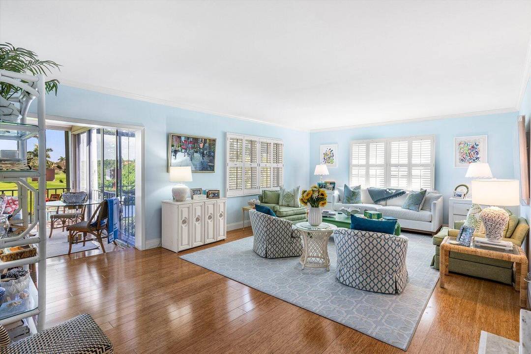 Abundant natural light highlights the panoramic golf course views from this 2BR 2BA residence.