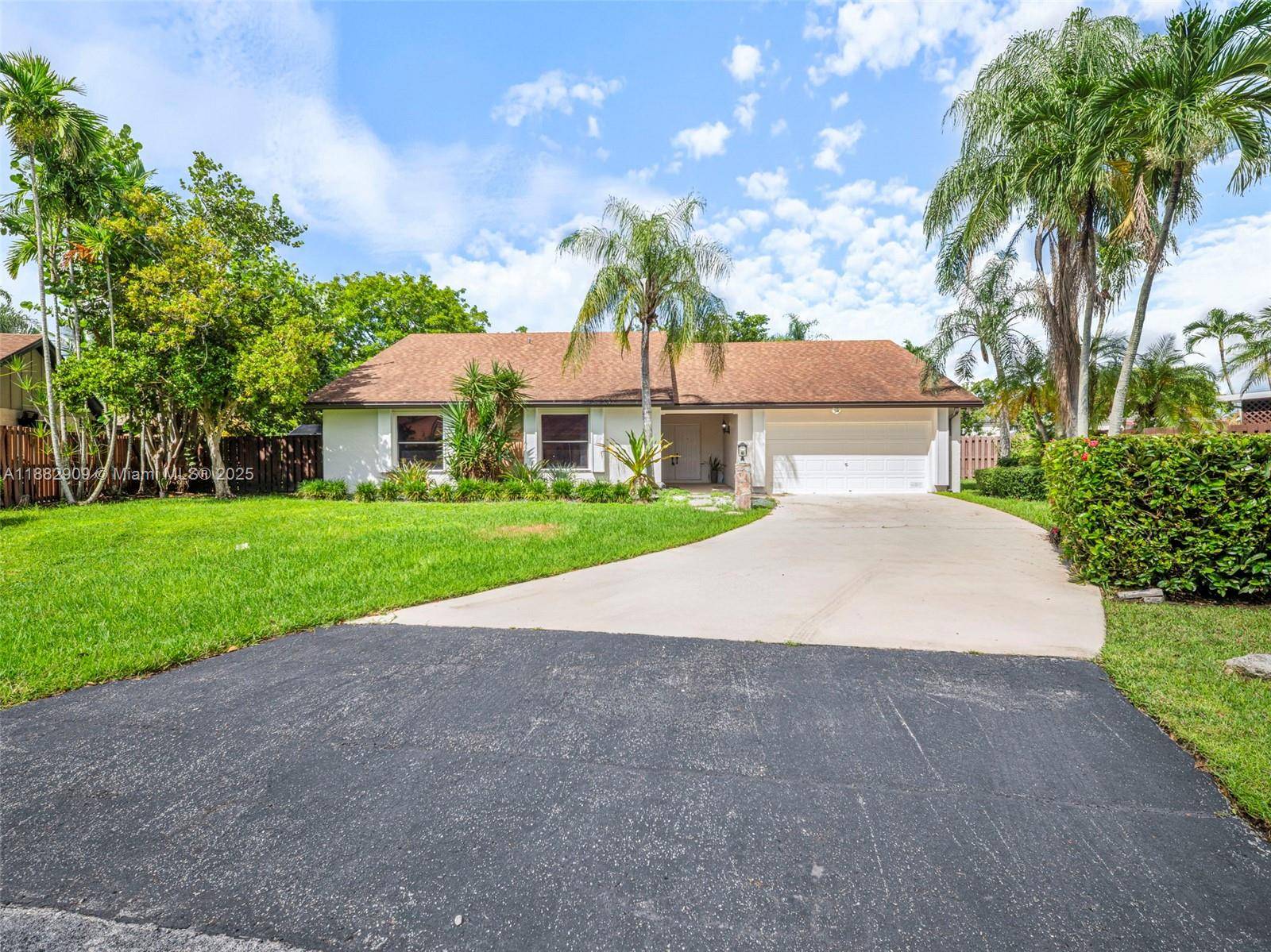 Elegant and beautifully refreshed residence, 4 bedrooms 2 1 2 bathrooms, 2 car garage, oversized lot, newly painted interiors and exteriors, spacious floor plan, and laundry room with brand new ...