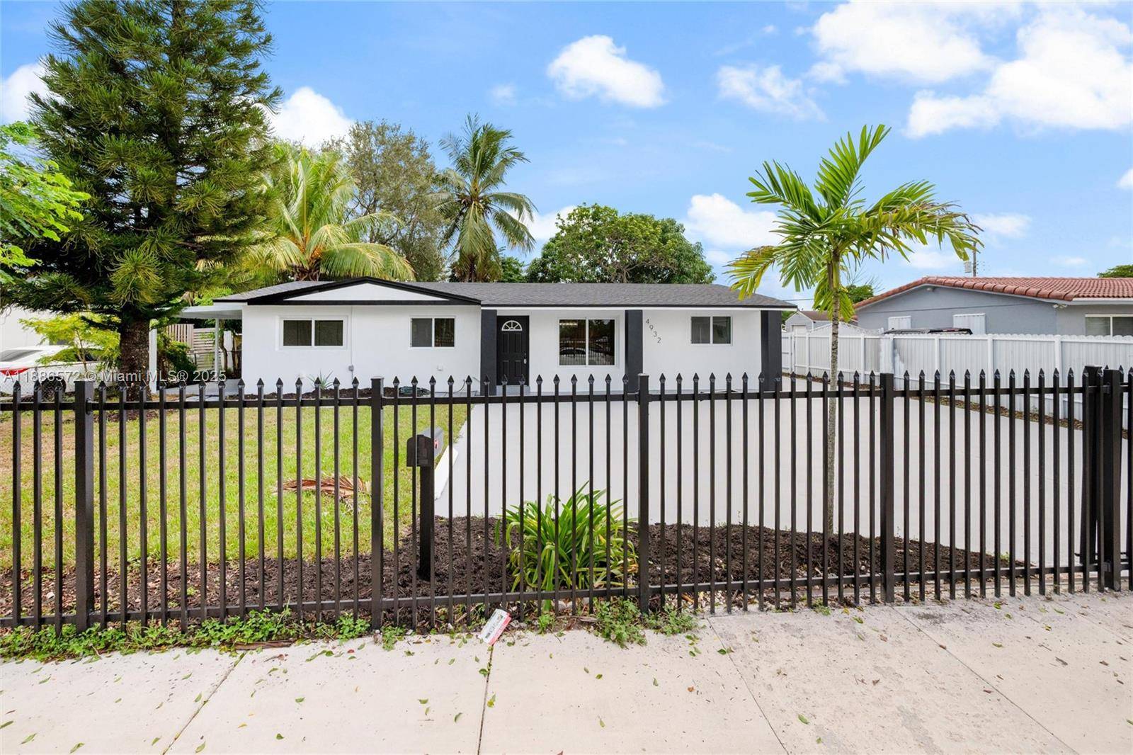 Exquisite 3BR 3BA extra room that can be used as a bedroom Miami Gardens home with multi million dollar finishes !