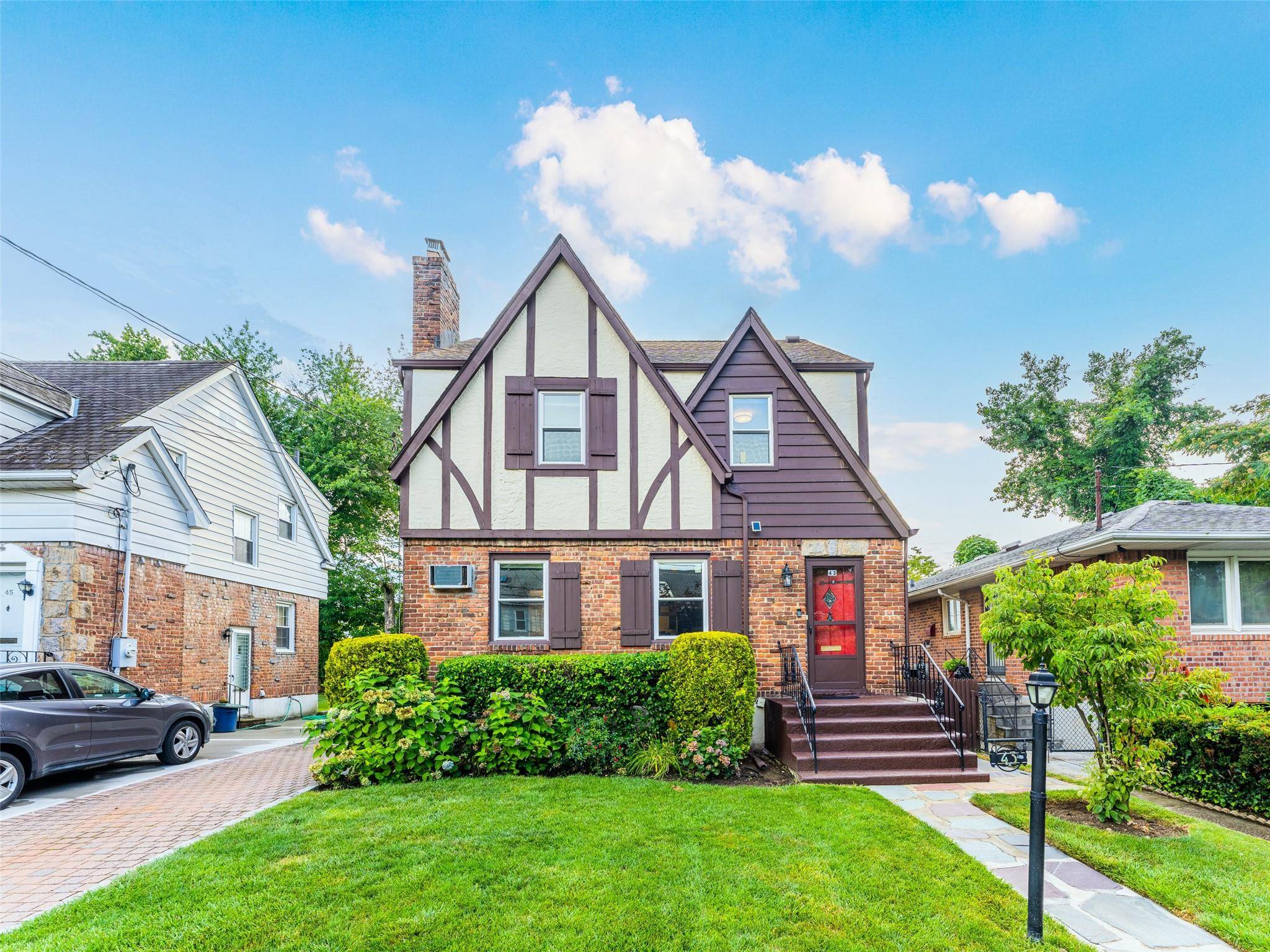 Welcome to this charming, well maintained home nestled in quiet tree lined yet convenient location of Great Neck.