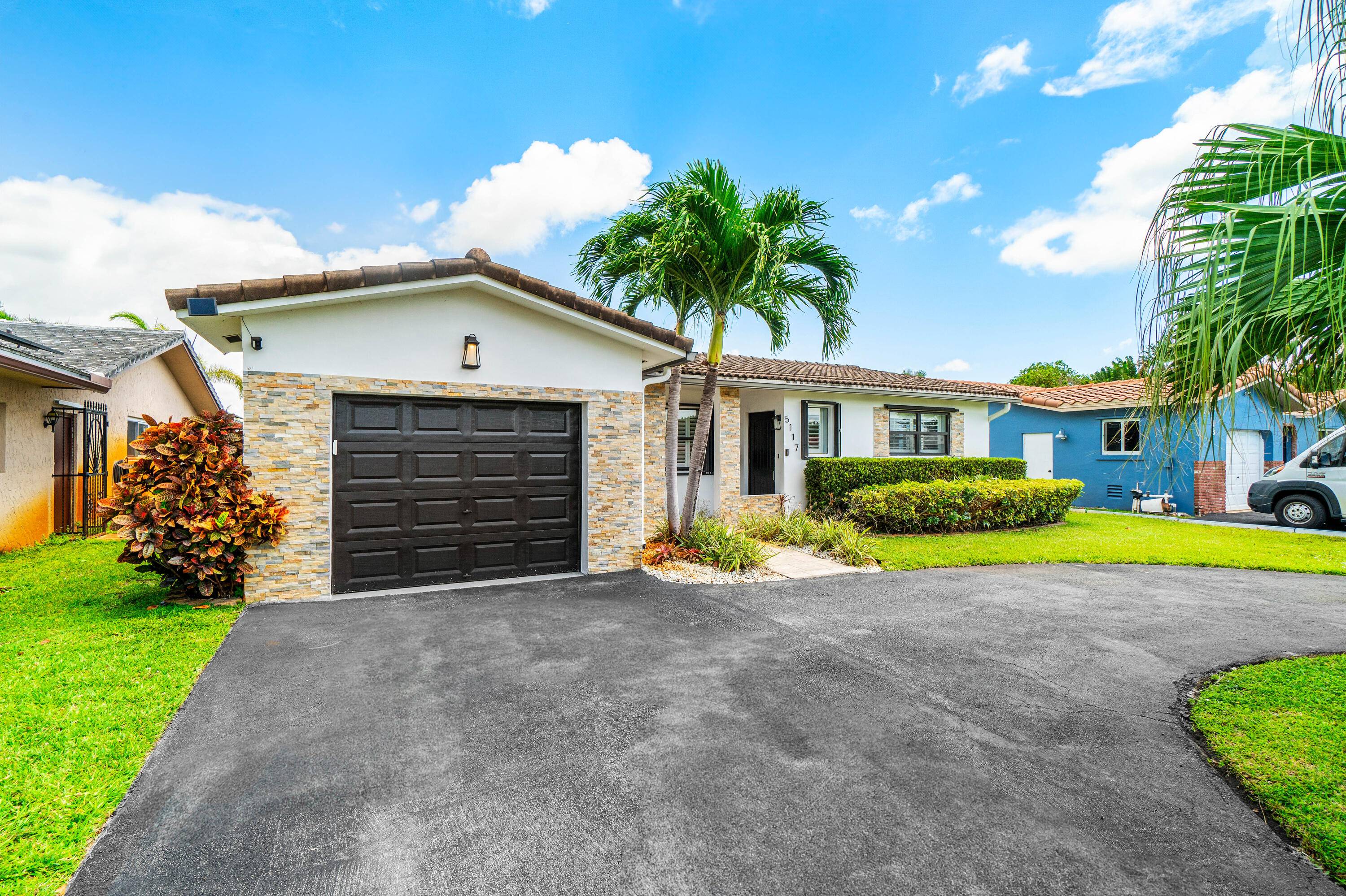 Welcome to 5117 Cleveland Street, a beautifully renovated home nestled in the heart of Hollywood Beach.