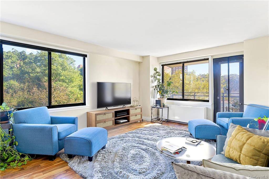 Welcome home to this is a rare corner 1 bedroom with a generously proportioned private terrace at the Manor Tower luxury co op.
