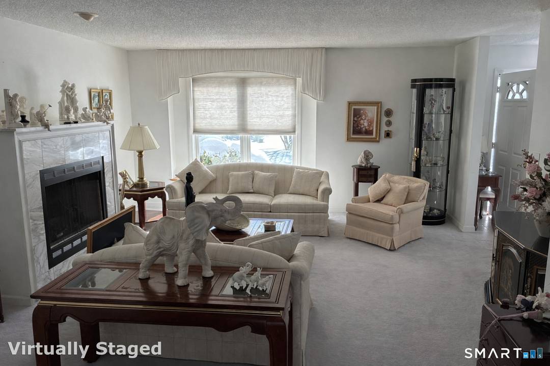 Beautifully maintained detached townhouse condo in a private, highly desirable gated community.