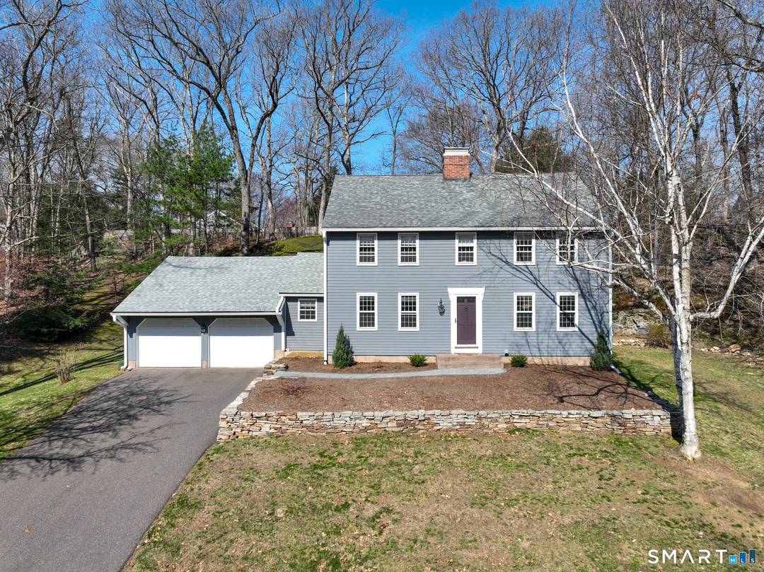 This highly desirable property in the Farmcliff area offers a charming reproduction style colonial home with numerous features.