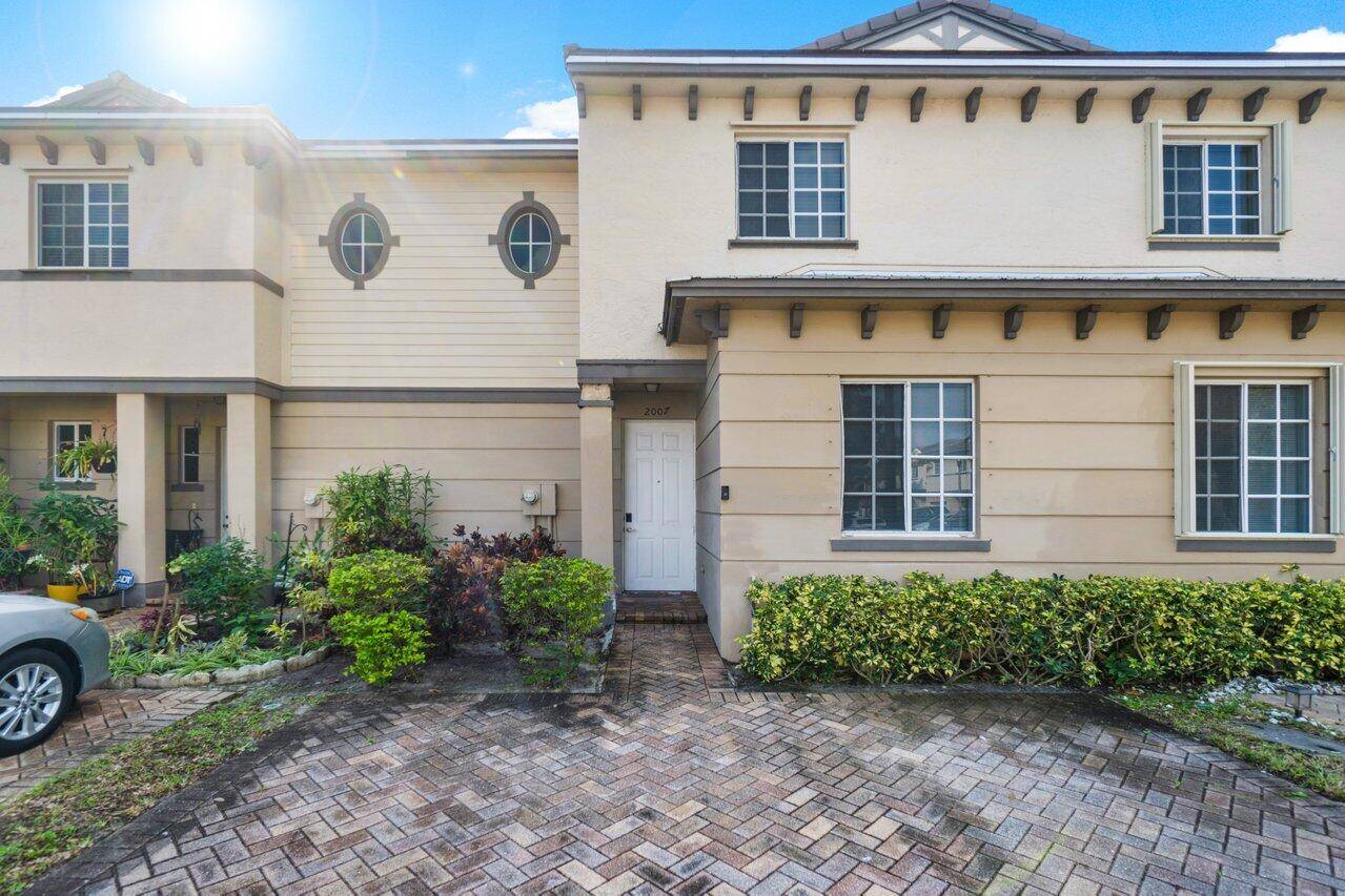 Step into this elegant two story townhome, perfectly situated in a highly coveted gated community.