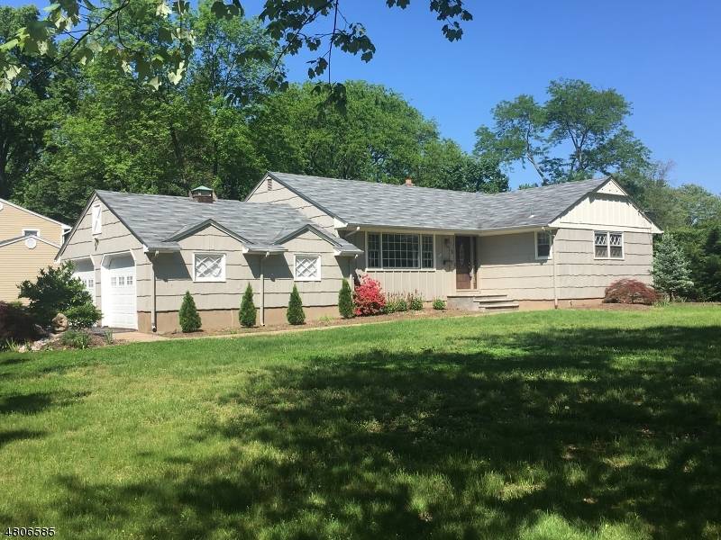 ONE FLOOR LIVING 3 bedroom 2 bath ranch style home with updated kitchen, dining area, family room, mud laundry room, hardwood floors, central air, 2 car garage, storage shed.