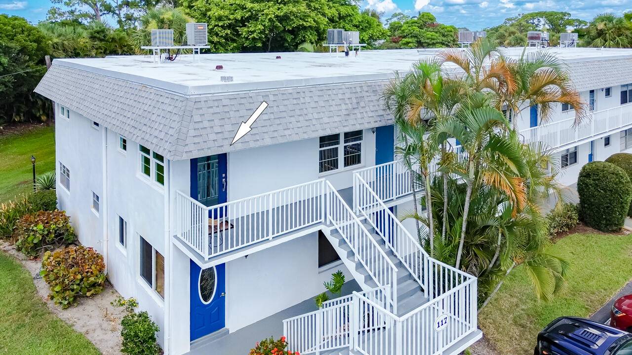 Beautifully updated 2BD 2BA corner unit with IMPACT windows and a stylish impact front door !