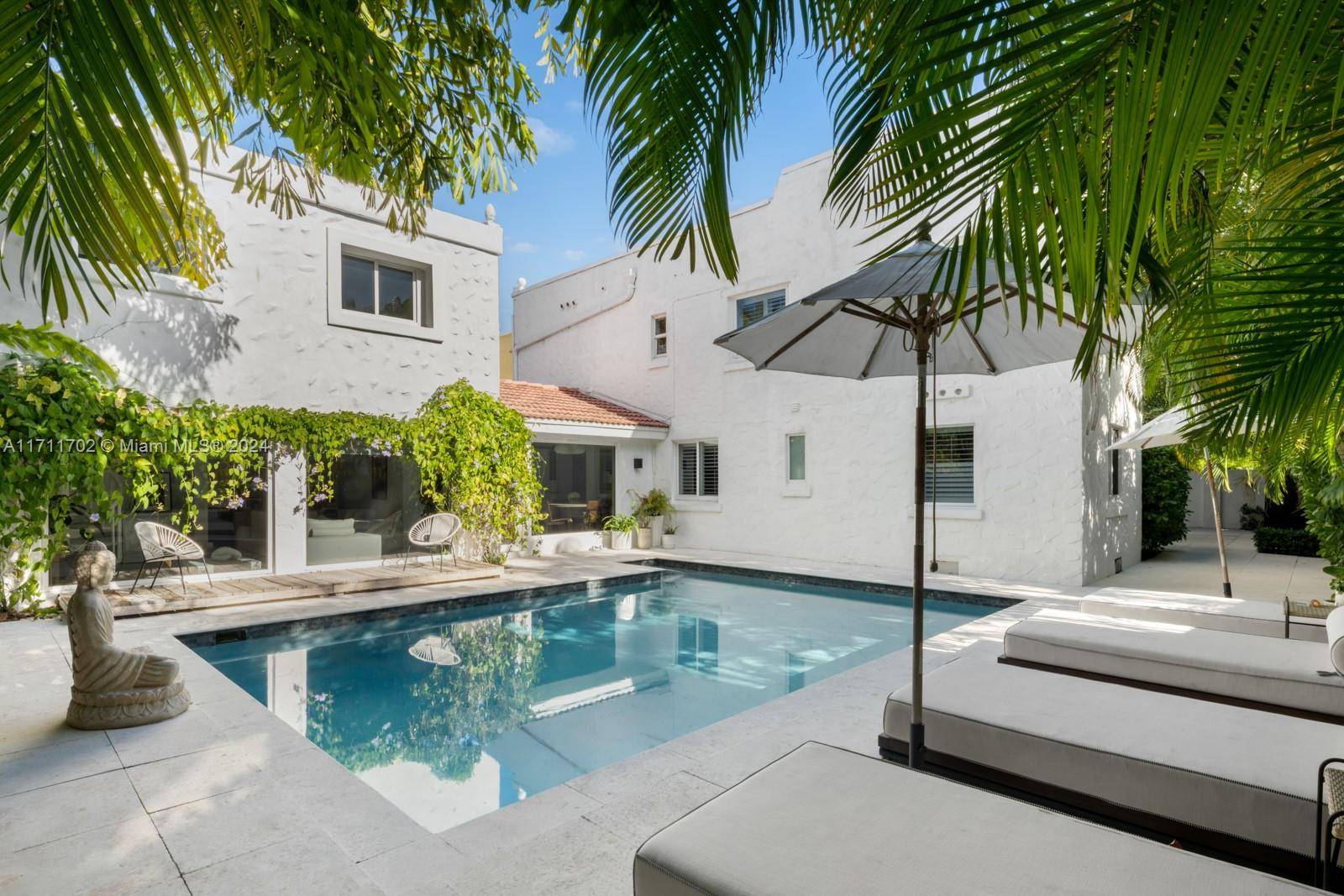 This stunning 5 bedroom Mediterranean style home offers 3, 770 SF of luxurious living space, combining elegance and comfort in a serene, tropical oasis.