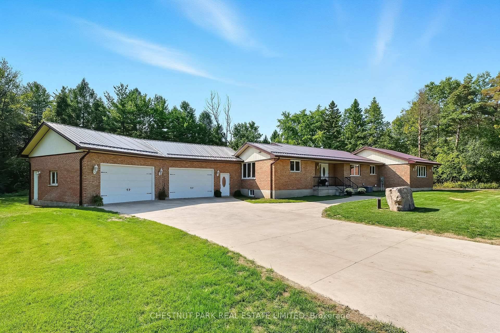Expansive raised bungalow with generous square footage on a private 133ft x 168ft lot has brand new steel roof 2025 amp ; 2 separate garage spaces totalling over 1600 sqft.
