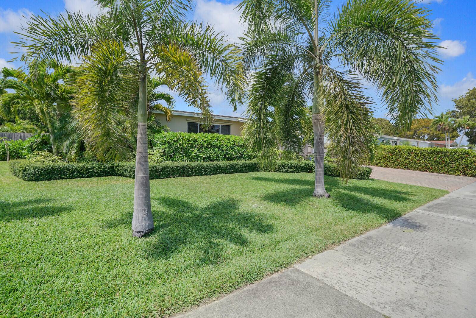 WELL MAINTAINED SPACIOUS SINGLE FAMILY HOME offering 2 bedrooms, 2 baths and a large addition of a family room, dining and or office.