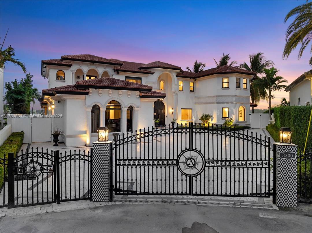 This spectacular waterfront home is located in the prestigious gated community of Eastern Shores.