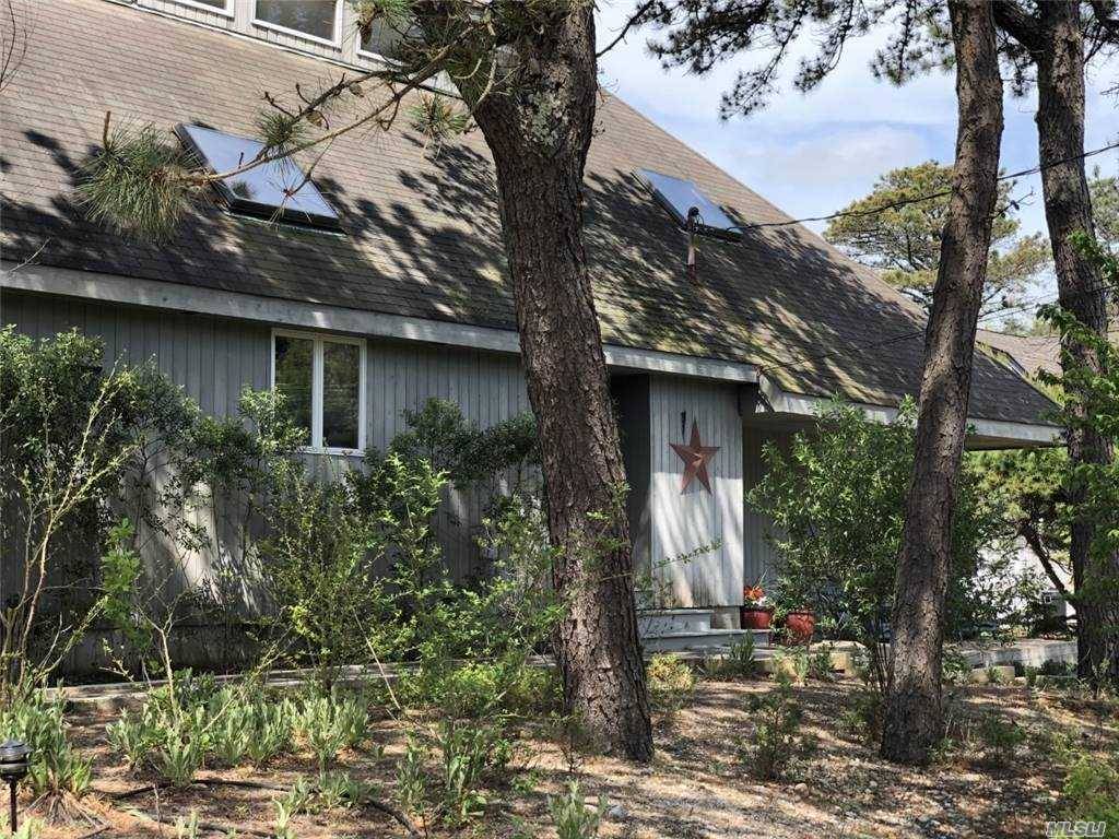 Rental Reg. 20 117. Spacious 2 story contemporary features 4 bedrooms, The spacious master bedroom with porch is on the second floor with three additional bedrooms on the first floor.