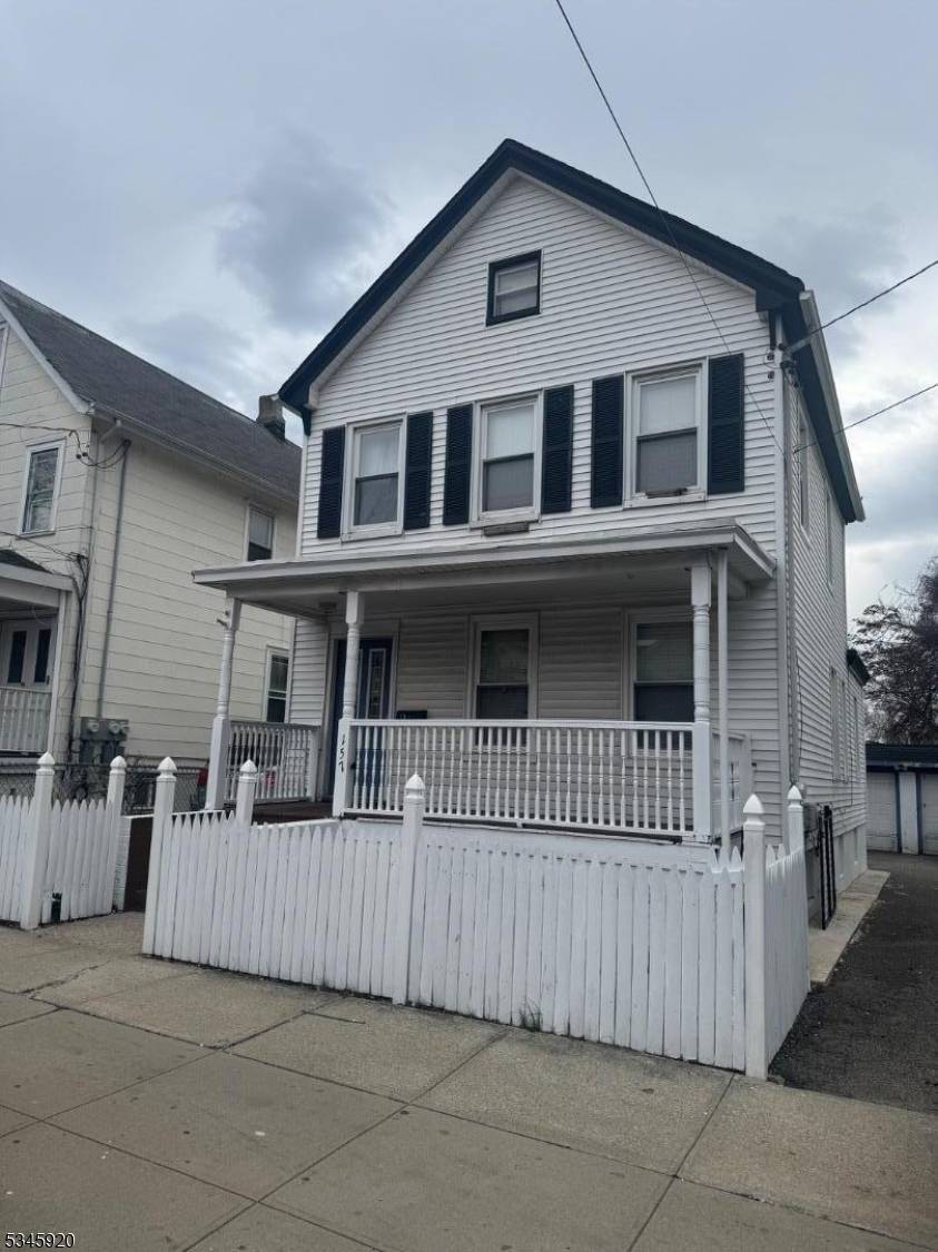 Charming three bedroom home offering spacious living with a detached garage.
