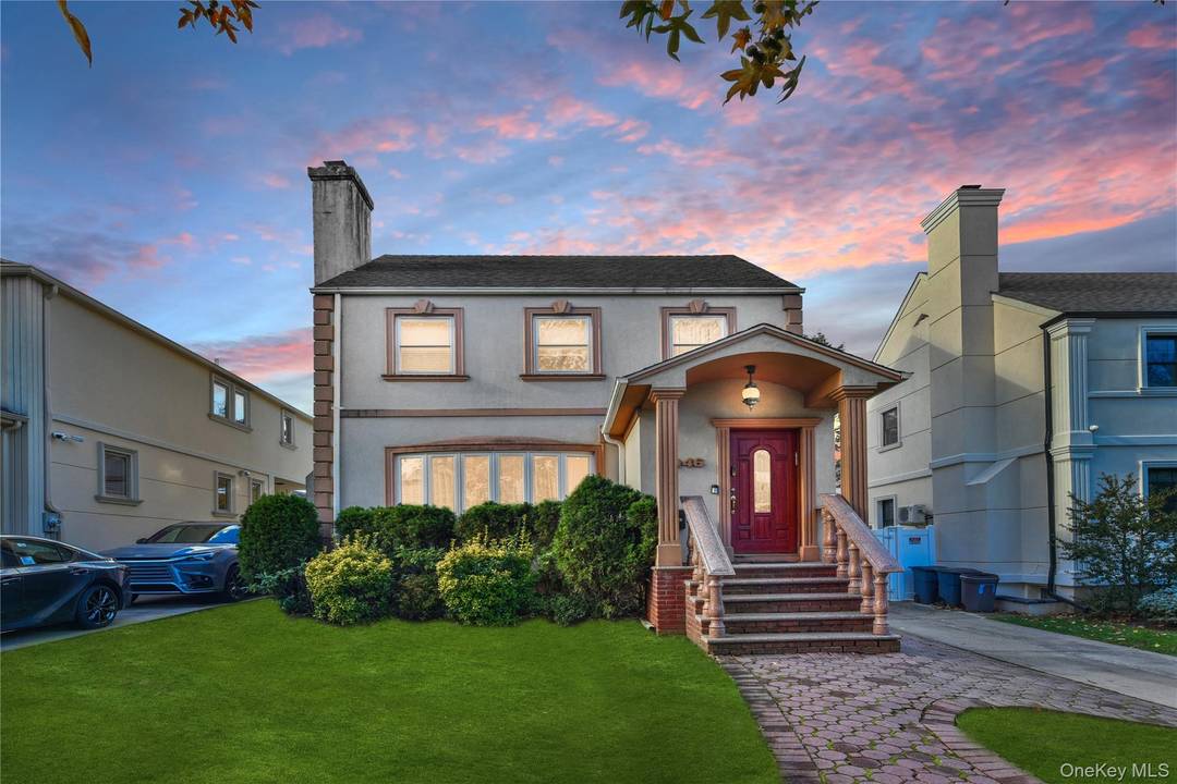 Welcome to this beautifully fully extended and fully renovated Side Hall Colonial nestled on a tree lined street in Hollis Hills.