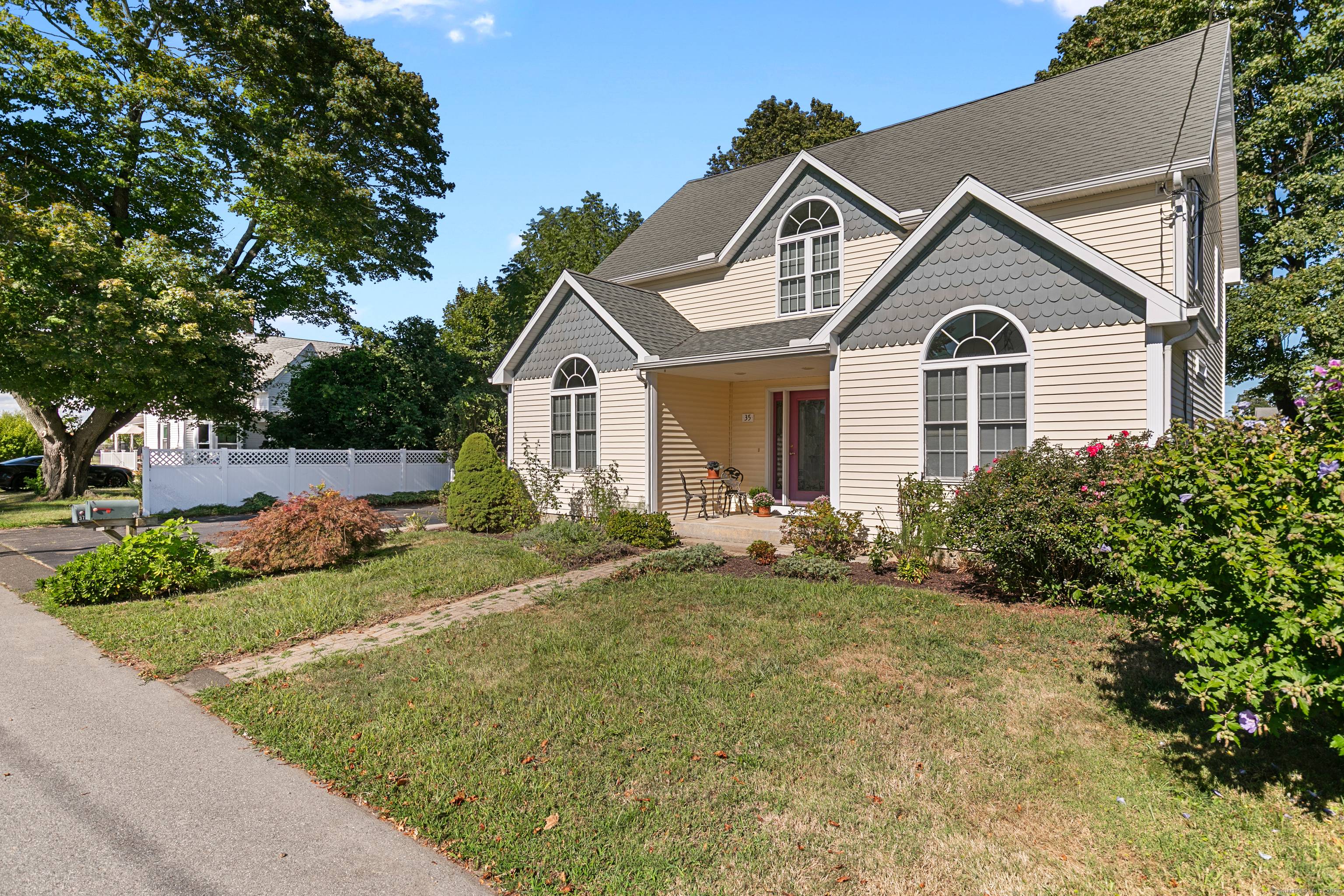 Embrace the ultimate shoreline lifestyle with this stunning two family home perfectly positioned in the heart of coveted Niantic Village.