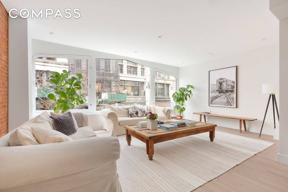 Completely renovated full floor, two bedroom home, boasting spectacular finishes and top notch appliances in a historic loft building just off Union Square.