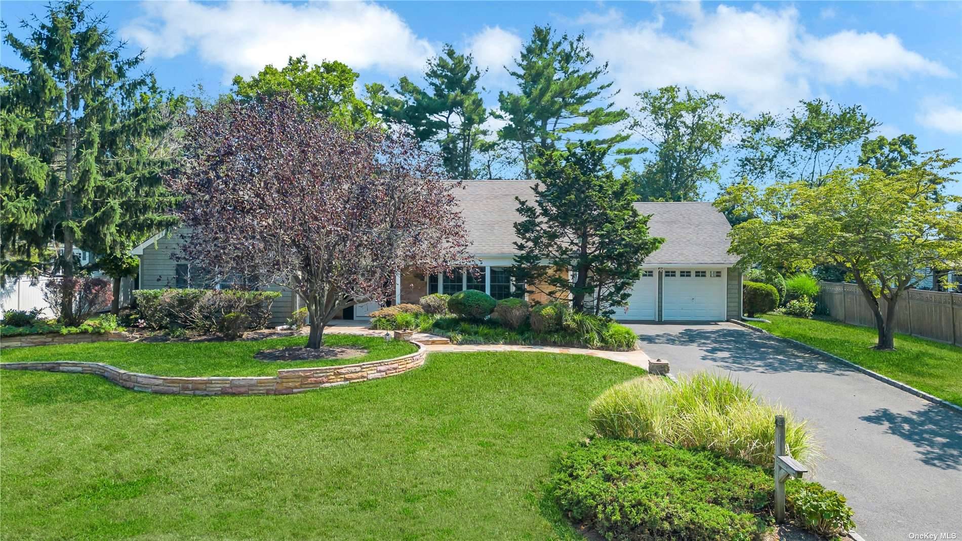 Welcome home to this absolutely gorgeous 3100sqft 5 bedroom, 3 full bath colonial located in Three Village School District !