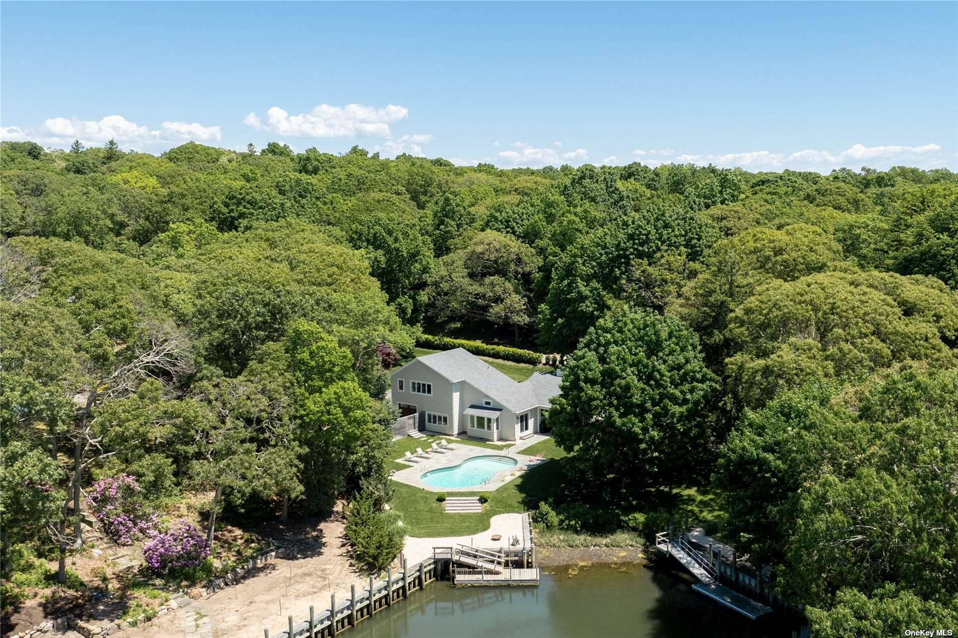 Nestled in the heart of one of the North Fork's most coveted neighborhoods, this classic Nassau Point beach house offers a unique blend of charm and modern comfort.