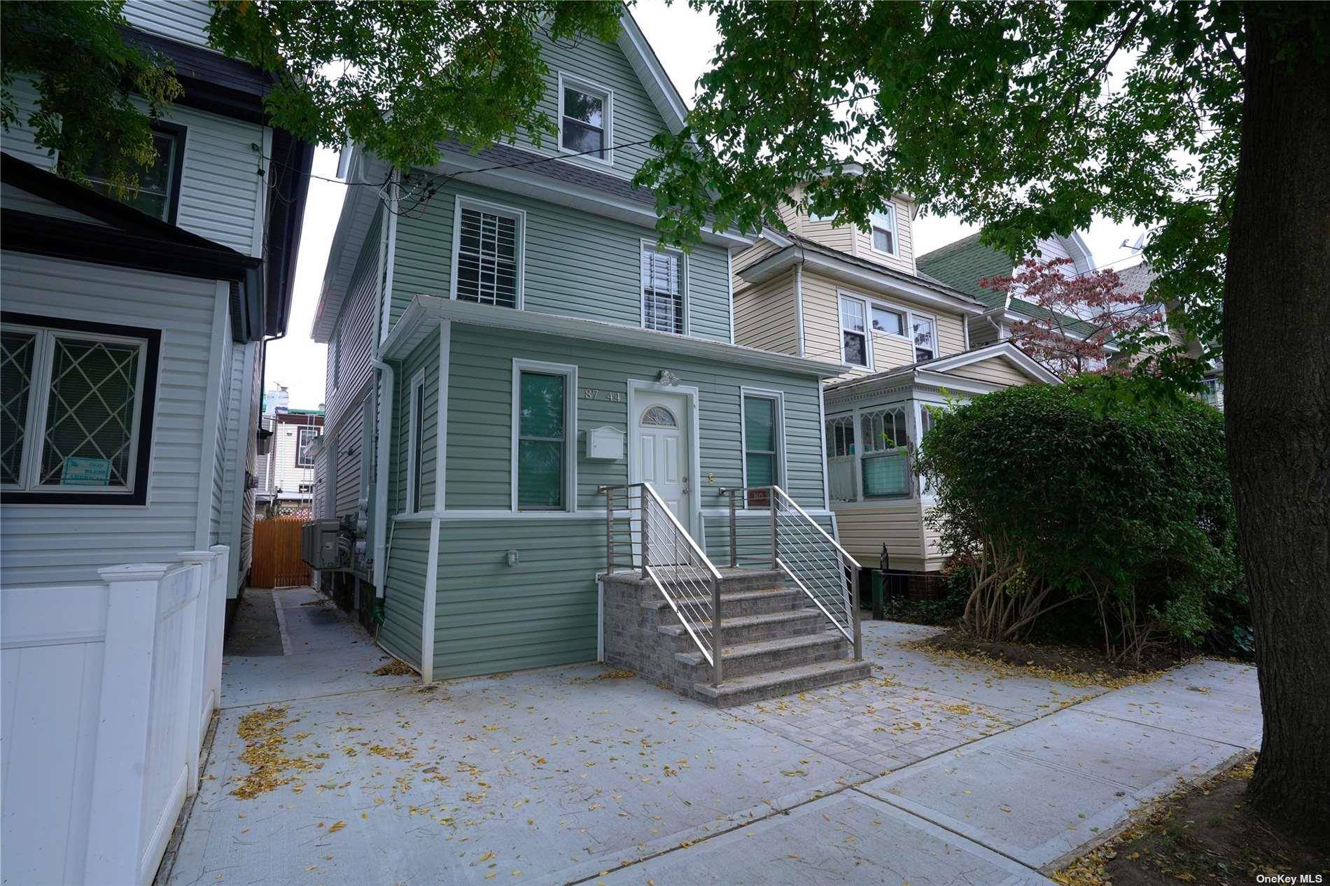 Welcome to 87 44 89th St a newly renovated Legal 2 family home in the heart of Woodhaven.