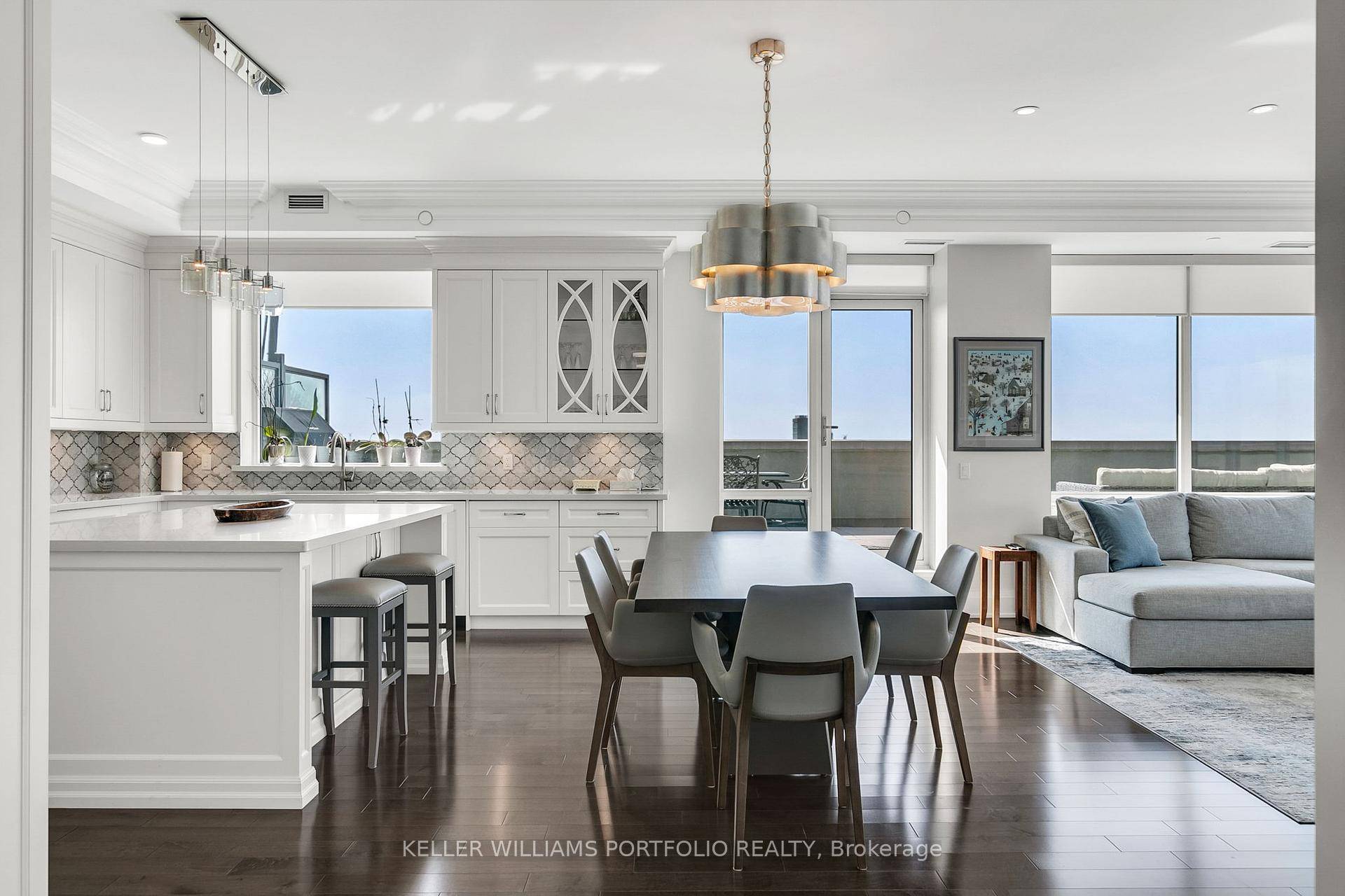 Perched high above the trees, this rare penthouse offers nearly 2, 000 sq.