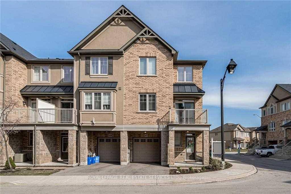 Welcome to this stunning 3 storey end unit townhome, ideally located in a highly sought after, family friendly neighborhood in Upper Stoney Creek.