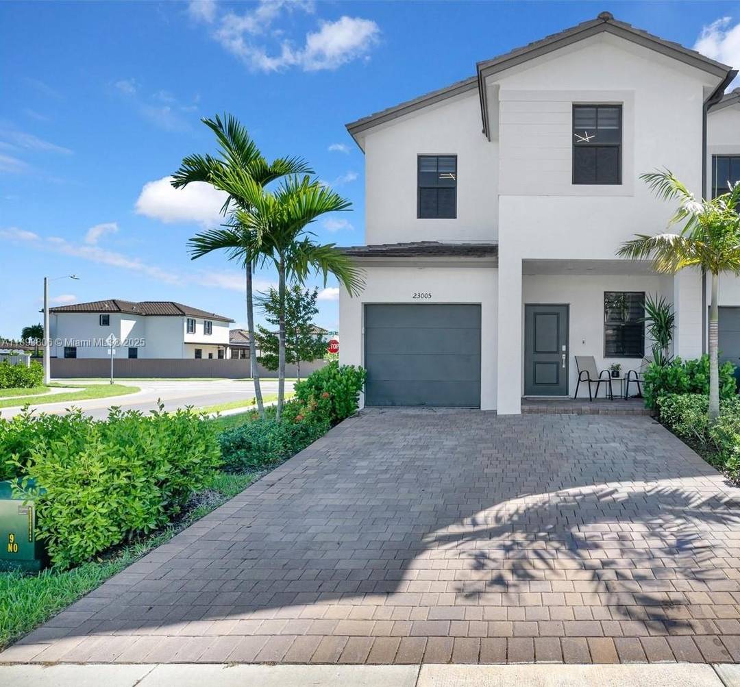 ASSUME SELLER'S 4. 99 MORTGAGE Rare end unit 2 story townhome with garage in Southwest Miami showcasing high end upgrades throughout.