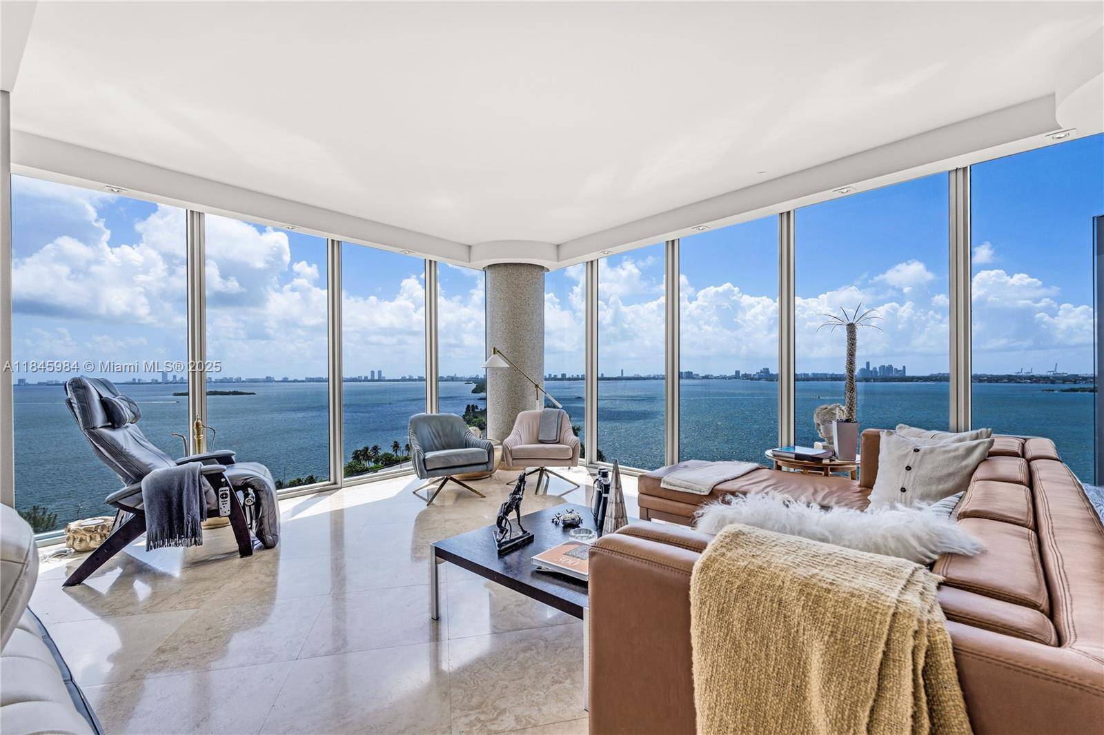 Iconic, wide open bay views from Blue s premier corner line define this rare 2BR 2.