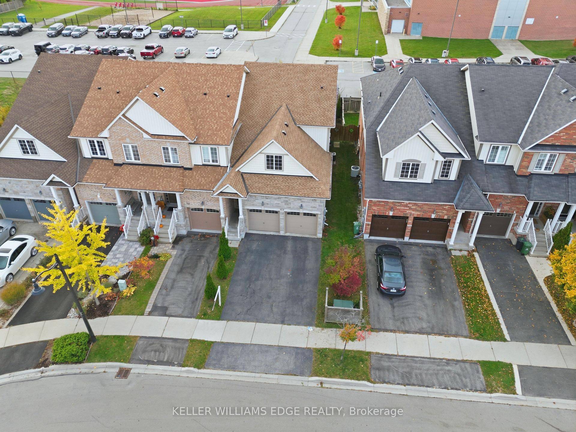 Welcome to 62 Browview Drive, a beautifully maintained end unit freehold townhouse in the heart of Waterdown.