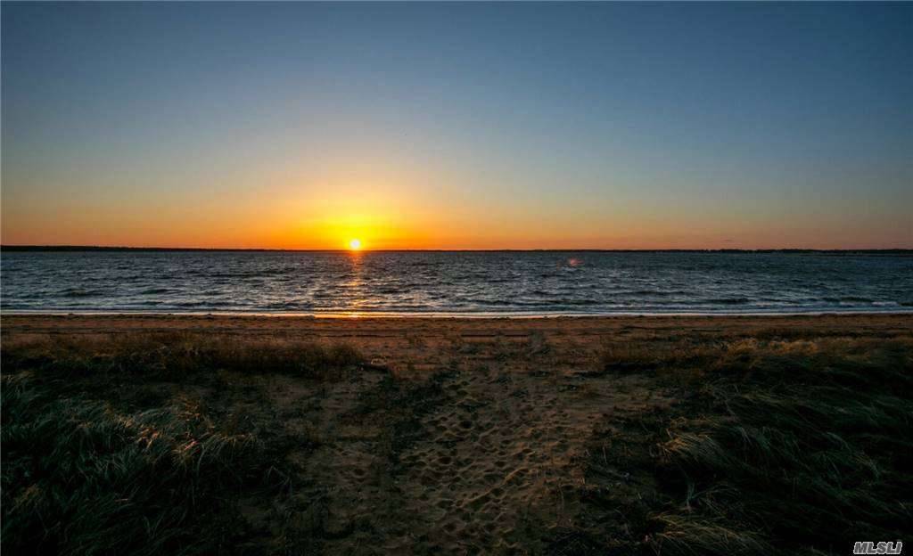 Chic New Hamptons Designer Summer Getaway with spectacular one of a kind sugar sand private Beach !