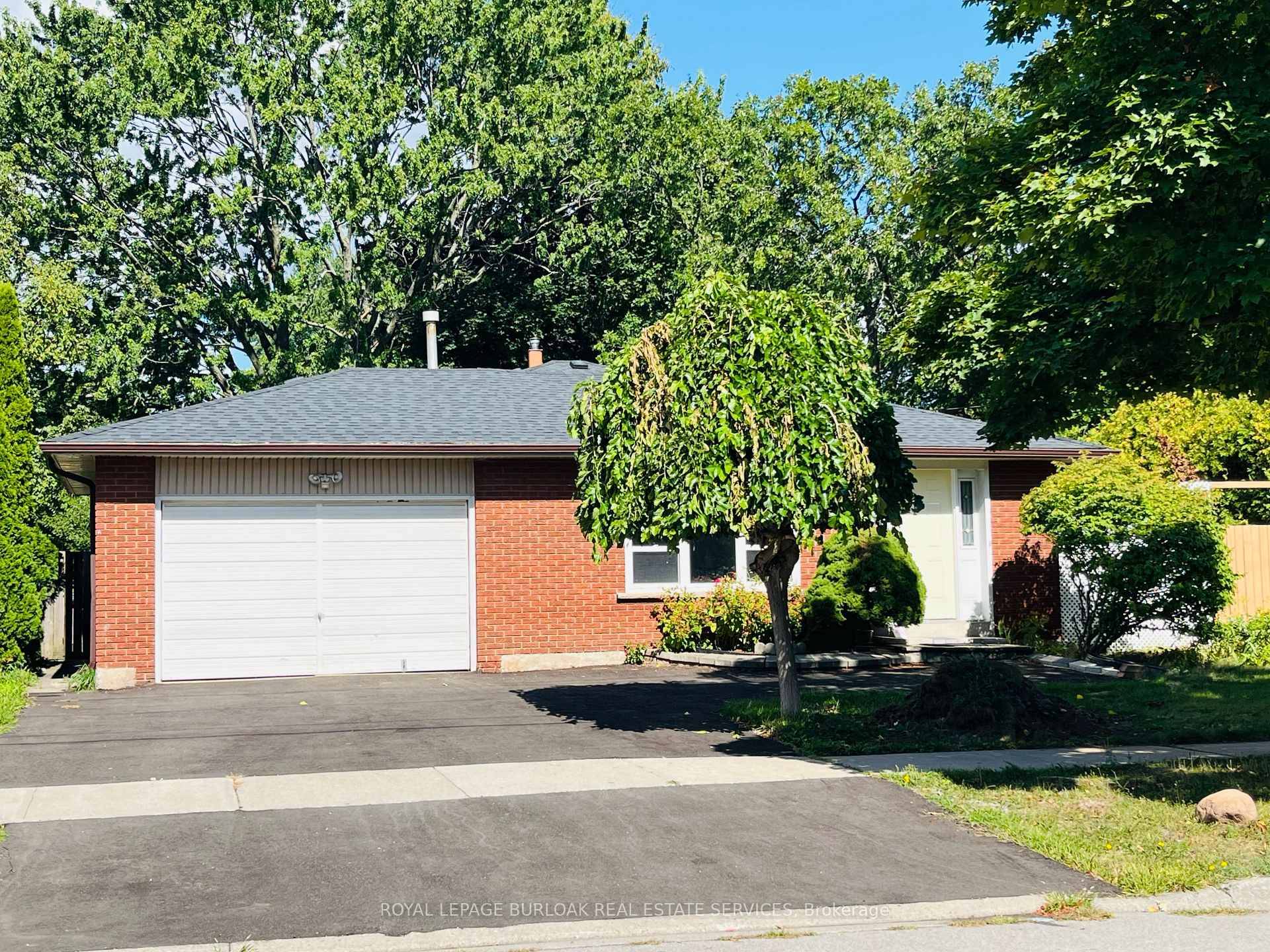 Welcome to this spacious backsplit home, perfectly designed for comfortable family living in one of Burlington's most desirable neighbourhoods.