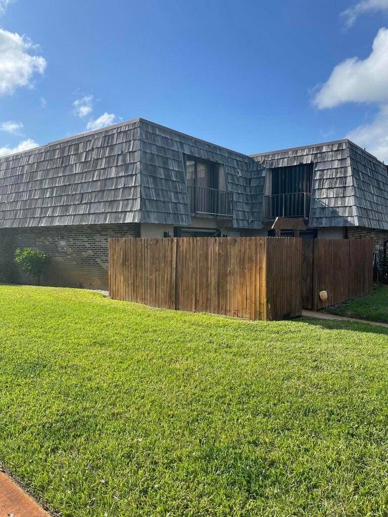 This Beautiful two story Townhouse has a Fenced In Back Yard, First Floor is tiled throughout, BRAND NEW KITCHEN CABINET, GRANITE COUNTERTOPS WITH BACKSPLASH.
