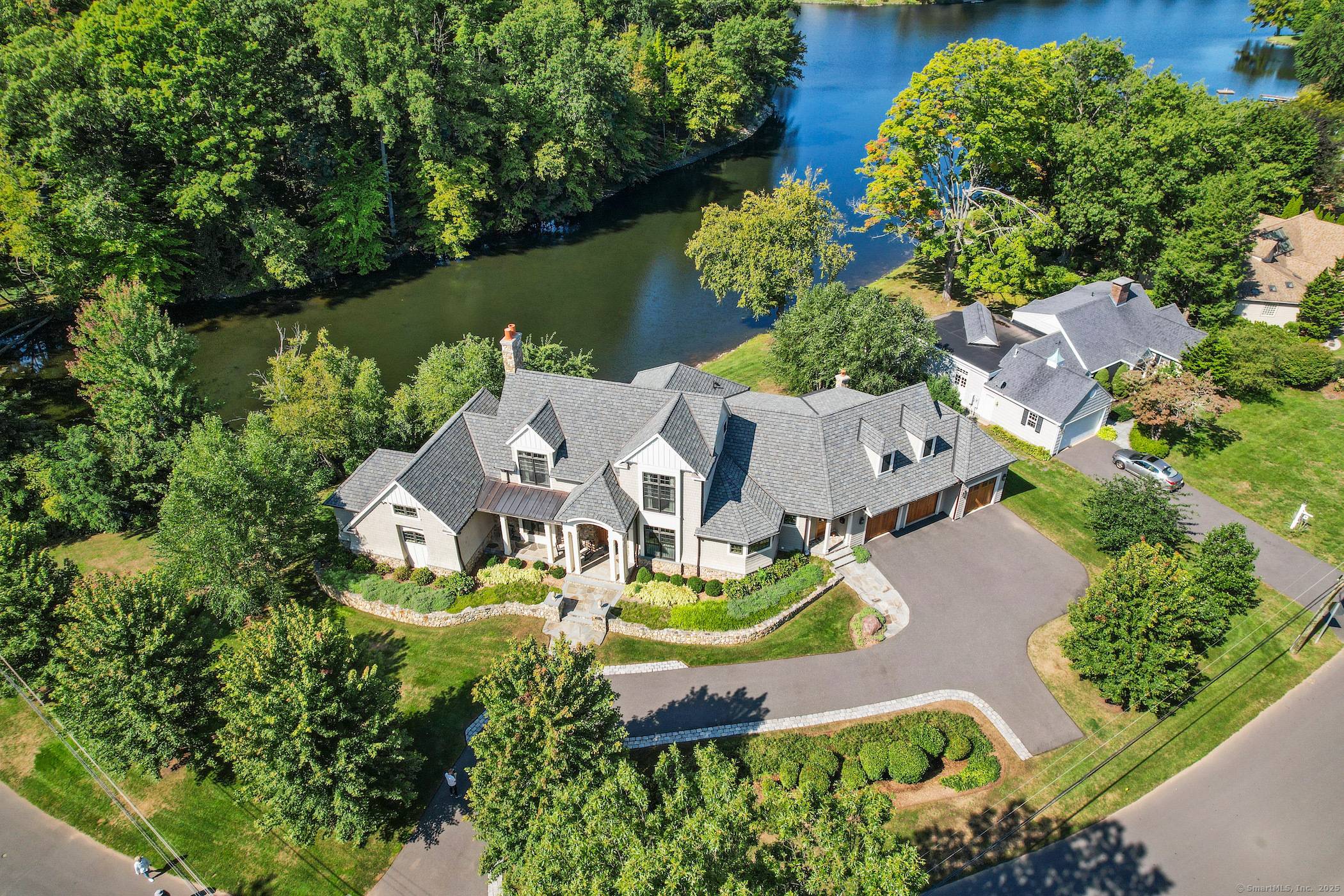 A Waterfront Masterpiece at Woodridge Lake.