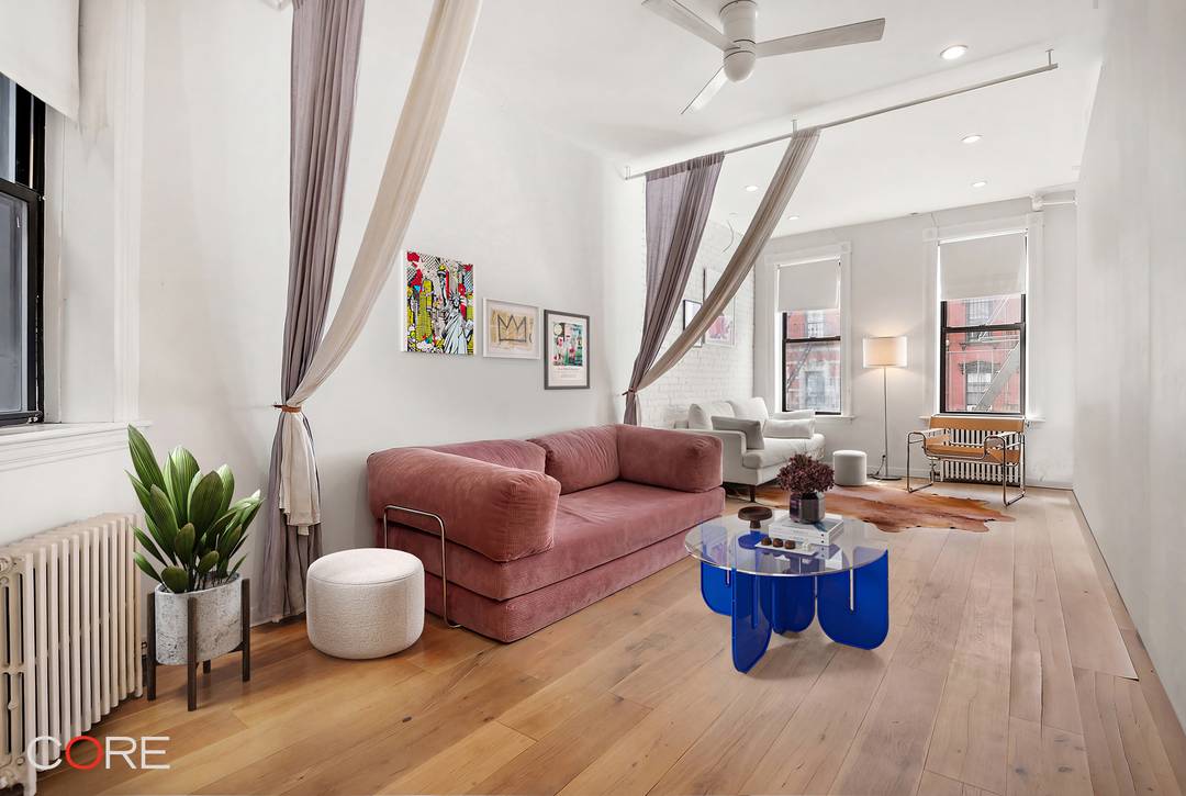 This beautiful, airy, and loft like home is just one flight up with four south facing windows that flood the space with natural light throughout the day.