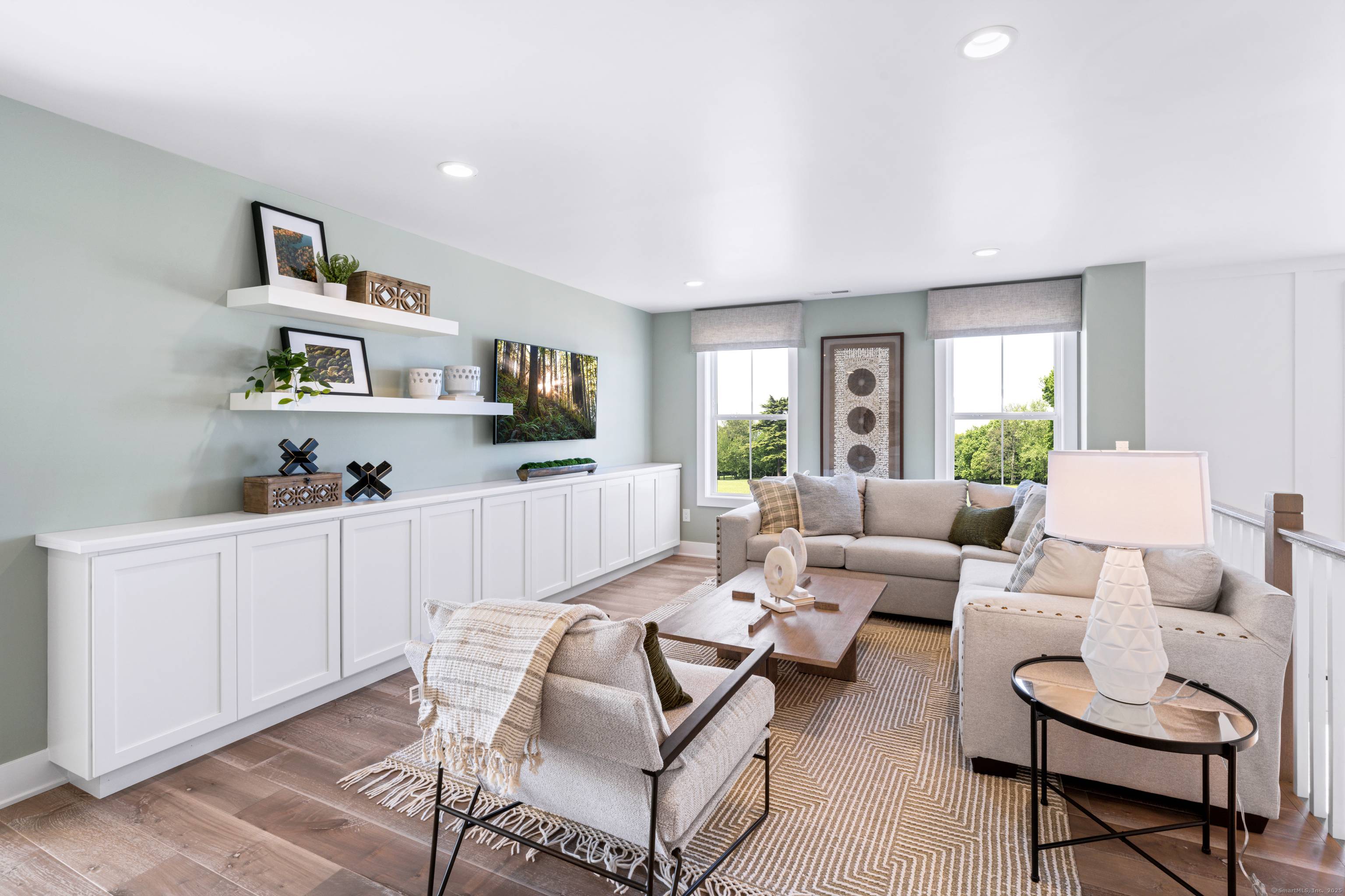 Soaring ceilings and graceful details define the Albrecht's thoughtful design.