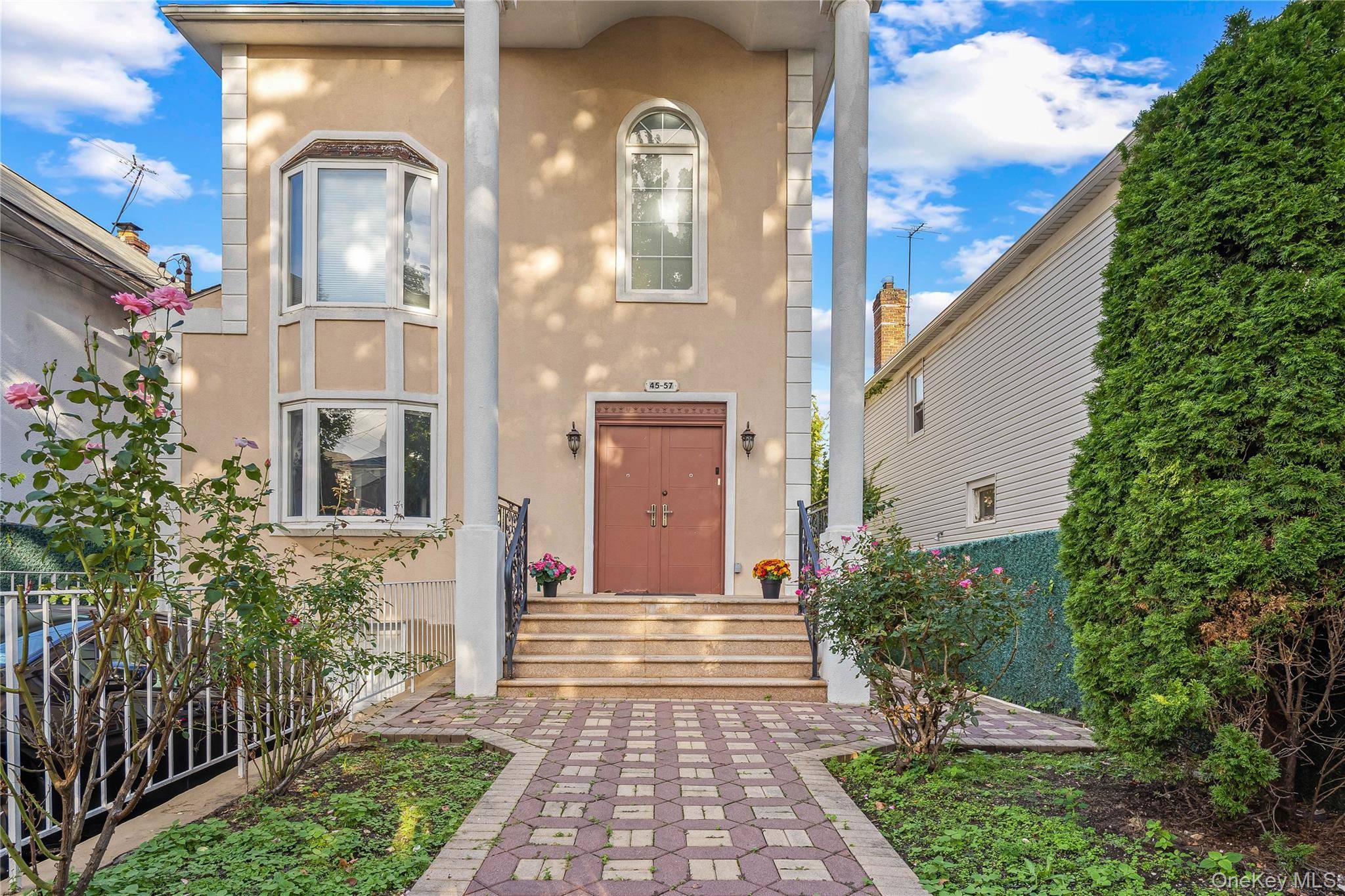 Welcome to this charming all brick home in the heart of Flushing !