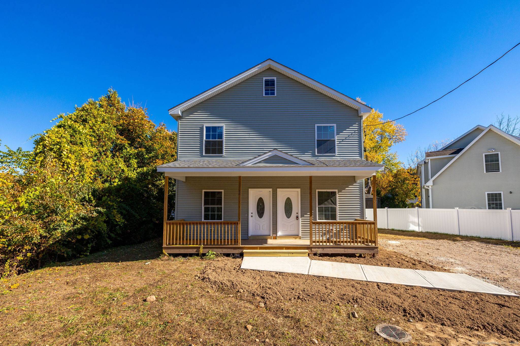 Brand New 2 Family Home with Pond Views in the Heart of Manchester !