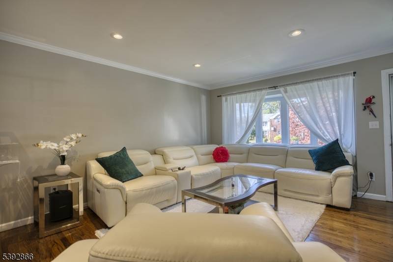 Welcome to this beautifully renovated single family home located in the quiet and charming North Side of Elizabeth's Portuguese neighborhood.