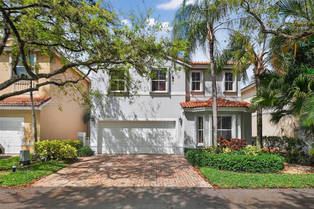 Welcome to your dream home in the prestigious gated community of West Lake Village in Hollywood, Florida.