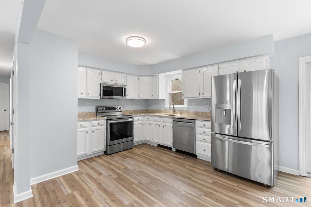 Welcome to 33 Deer Ridge Road, where comfort, privacy, and endless possibilities join together.