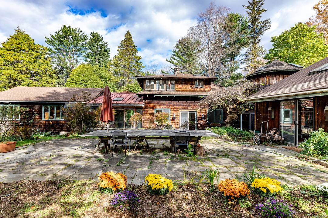 Located near the prestigious Mayflower Inn and just minutes from the Washington Green in an area of many fine estates, this 1890's Barn style home with it's silo and 1970's ...