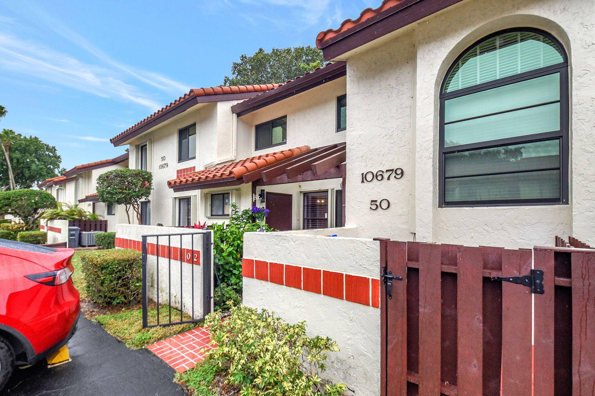 Very spacious 2 bedrooms den 3rd bedroom 2 bathrooms lake view condo in a 55 gated community of Palm Chase.